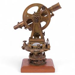 19th Century brass transit theodolite by Troughton & Simms, the sighting telescope with rack and pinion focusing above an inset compass, upon four levelling feet and a rectangular wooden base, including base H35.5cm
