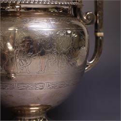 Early 20th century four piece silver tea service, comprising teapot, hot water pot, open sucrier and milk jug, all of oval bellied form with oblique gadrooned rim and upon four feet, the hotwater and teapot with wooden handles and finials, hallmarked William Lister & Sons, Sheffield 1912