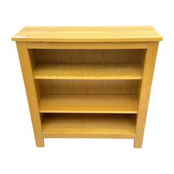 Five light wood open bookcases, four with two adjustable shelves, (W89cm, D29cm, H94cm), one with one adjustable shelf (W89cm, D29cm, H77cm)  