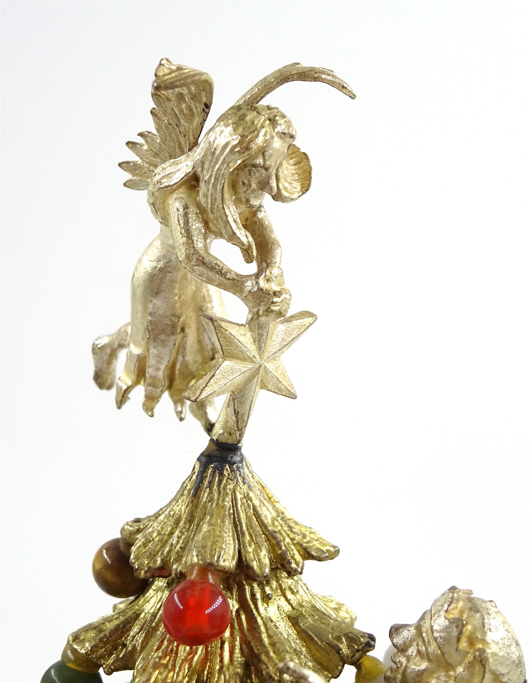 Christopher Nigel Lawrence limited edition silver and parcel gilt surprise mushroom, the textured domed cover opening to reveal two elves decorating a semi-precious gem set Christmas tree, upon a slate base, no 100/250, hallmarked Christopher Nigel Lawrence, London 1980, overall H9cm