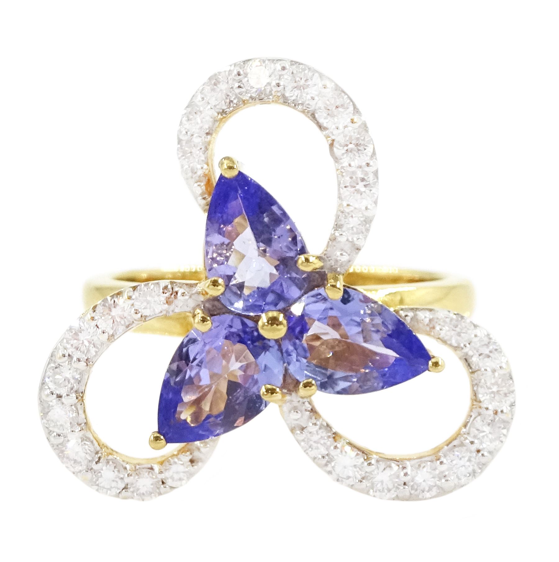 18ct gold tanzanite and diamond cluster ring, three pear cut tanzanite's, with round brilliant cut diamond surround, in an openwork swirl setting, hallmarked, total tanzanite weight 1.50 carat, total diamond weight 0.55 carat, with World Gemological Institute Report