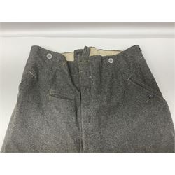 Pair of WW2 German Other Ranks trousers c1940-42, stamped C.& A. Brenninkmeyer Workstatten; WW2 German Army webbing belt with steel 'Gott Mit Uns' buckle; and WW2 German leather belt with 'Stahlhelm' (Steel Helmet League) members buckle (3)