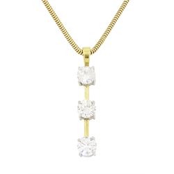 18ct white and yellow gold three stone round brilliant cut diamond pendant, on an 18ct gol...