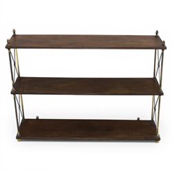 Regency brass and mahogany wall shelves circa 1820, the three shelves contained within a brass cross brace with brass finials, with wall fixings 
