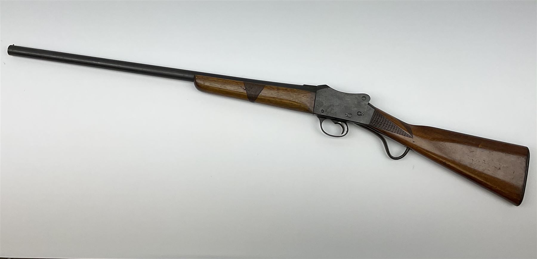 Greener GP Mark III 12-bore single barrel shotgun with martini underlever action, 64cm barrel, walnut stock with chequered grip and fore-end, serial no.36623, L107cm overall SHOTGUN CERTIFICATE REQUIRED