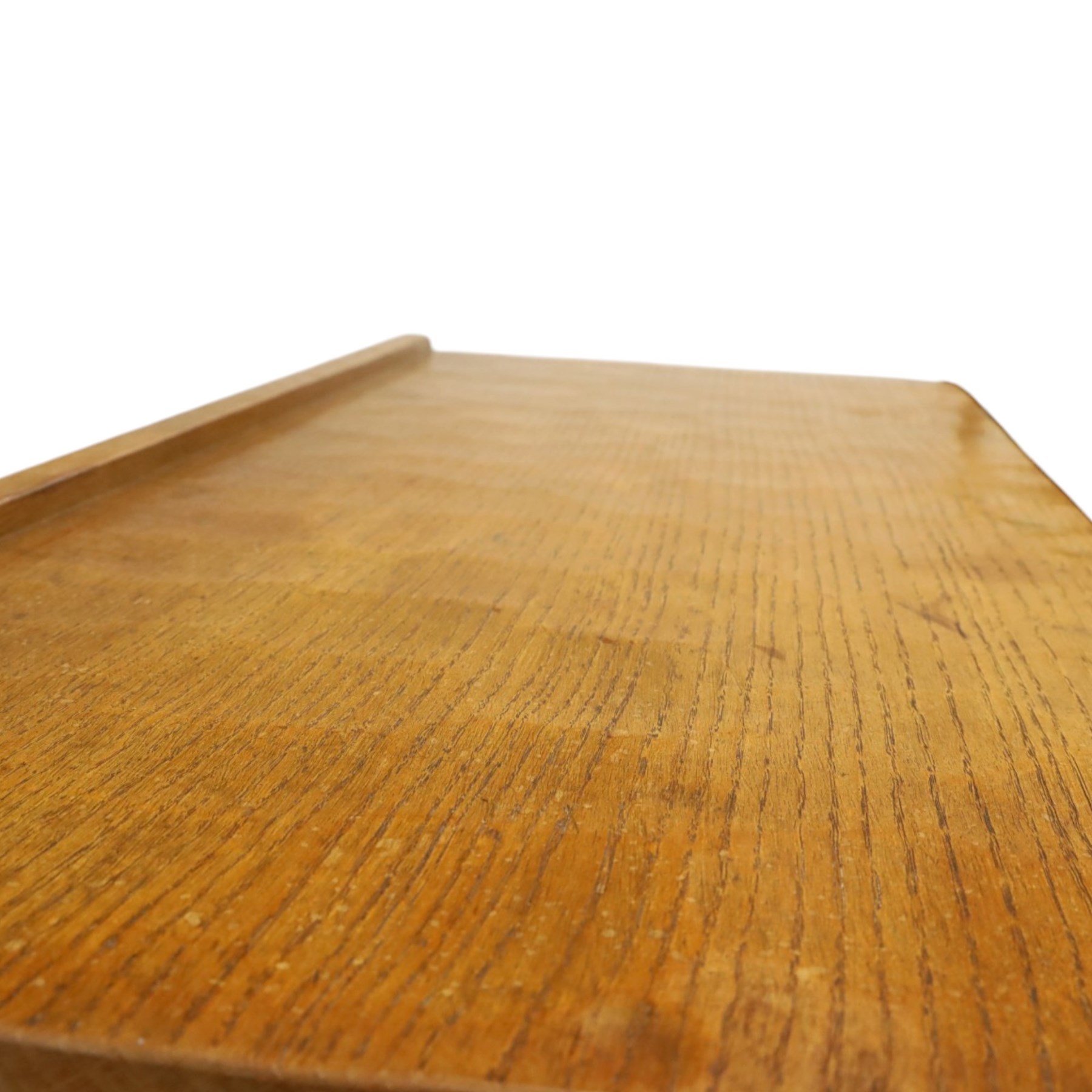 Mouseman - early-to-mid 20th century adzed and panelled oak chest, raised back over rectangular adzed top with canted corners, fitted with two short over three long drawers with turned knob handles, raised on octagonal feet, with carved mouse signature, by the workshop of Robert Thompson of Kilburn