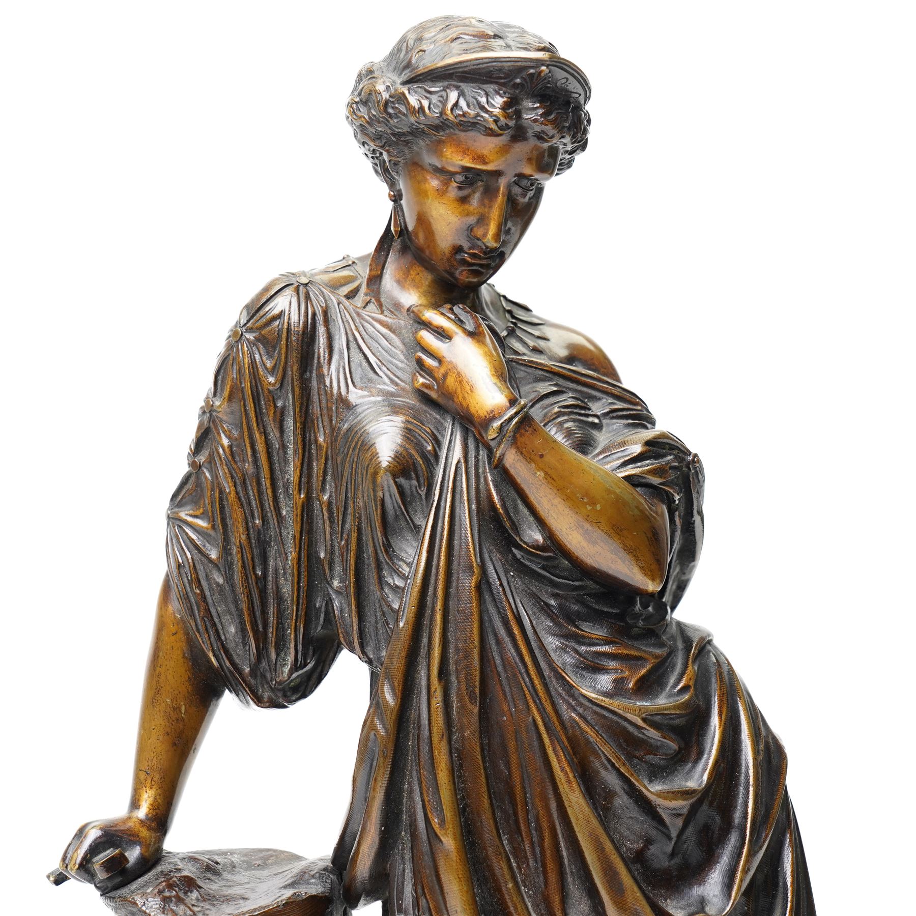 After the Antique - a pair of important 19th-century patinated bronze allegorical figures representing Calliope and Melpomene, the Muses of Epic Poetry and Tragic Drama, each modelled as a classically draped female figure standing beside a pedestal with climbing ivy, Calliope depicted writing upon a tablet, embodying poetic inspiration; Melpomene shown in contemplative pose and wearing a serpent bracelet, emblematic of wisdom, transformation and the inspired voice of drama, the pedestals inscribed respectively with the names of celebrated English poets and playwrights including Chaucer, Spenser, Milton, Pope, Cowper, Burns, Byron and Scott; the other with Shakespeare, Beaumont, Fletcher, Ben Jonson, Massinger, Congreve and Garrick, on integral square bases, each bearing incised or stamped foundry or model numbers to the underside, H47cm