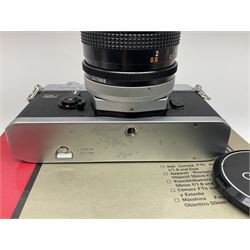 Canon FTb camera body, serial no. 715838, with 'Canon FD 50mm 1:1.8' lens, serial no. 207888, in original box, together with Canon FTb camera body, serial no. 557817, with 'Canon FD 35mm 1:3.5 S.C' lens, serial no. 126210 and Canon EX Auto camera body, serial no. 296244 with 'Canon EX 50mm 1:1.8' lens, serial no. 380869  