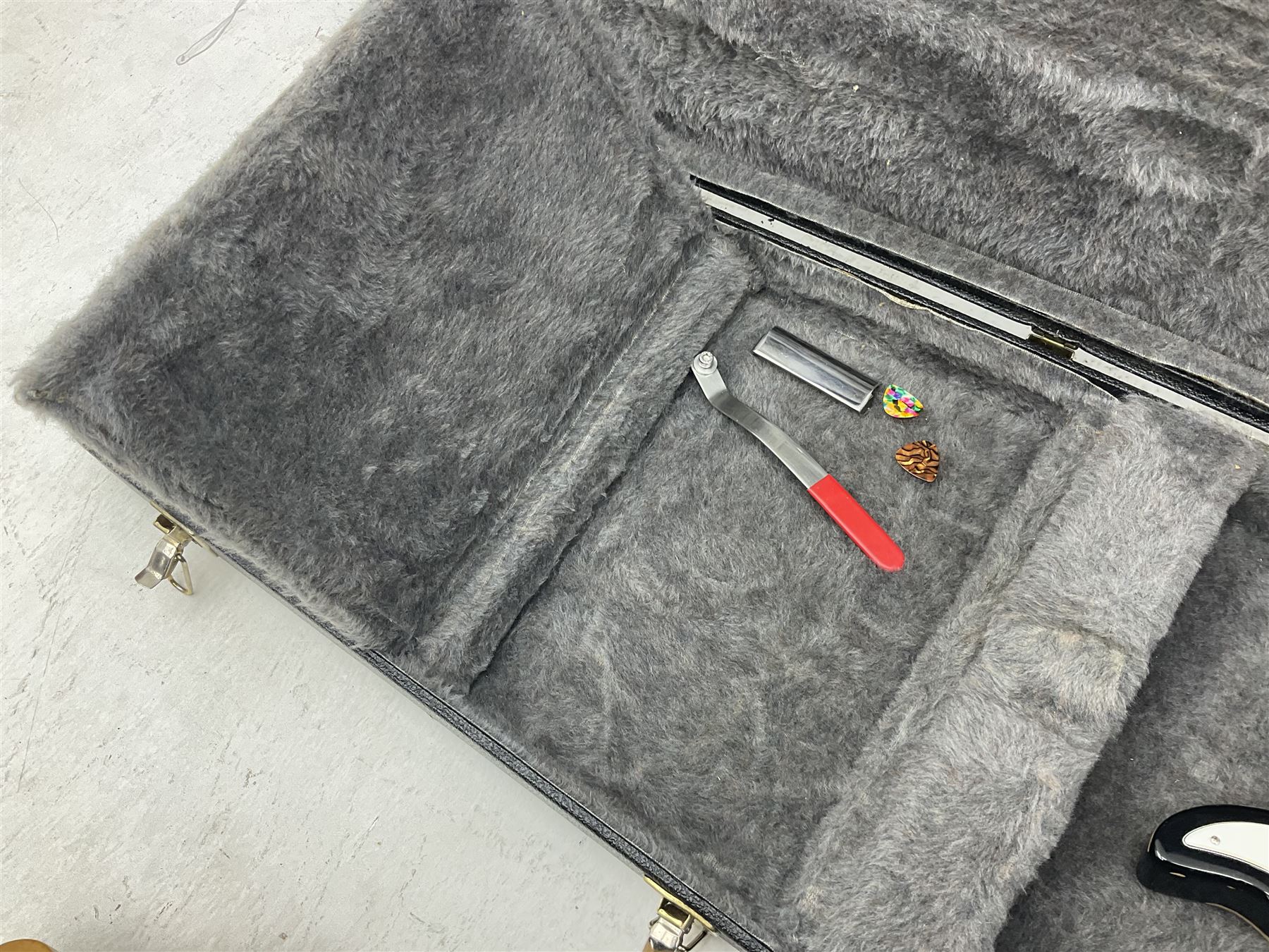 Fender style sunburst electric guitar with manuscript mark 'Zenta Stratocaster 1963' L97cm; in hard carrying case; another similar unmarked sunburst electric guitar; in gig bag; and Fender Frontman Amplifier, serial no.M473406 (3)