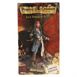 Three Pirates of the Caribbean statues, comprising a Neca limited edition Jack Sparrow Statue and two Gentle Giant limited edition animated maquettes - Elizabeth Swan and Davy Jones, all boxed