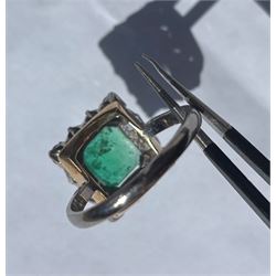 18ct white and yellow gold emerald and diamond cluster ring, single octagonal cut emerald of approx 1.55 carat, surrounded by twelve round brilliant cut diamonds, total diamond weight approx 0.95 carat