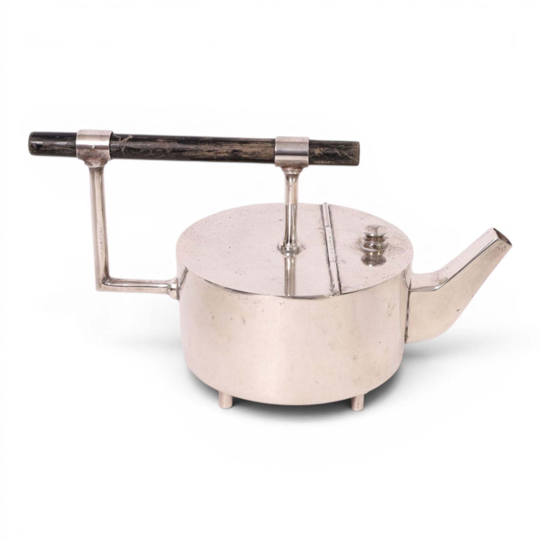 Manner of Christopher Dresser (1834-1904) - James Dixon and Sons teapot together with Hukin & Heath Christopher Dresser design coffee pot, of tapering cylindrical form with a strapwork handle, teapot H13cm 