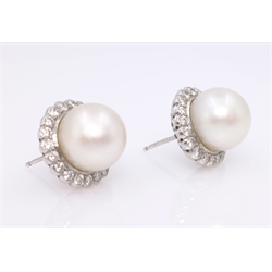  Pair of 18ct white gold South Sea pearl and diamond cluster stud ear-rings, each set with pearl 11mm, and twenty diamonds hallmarked  