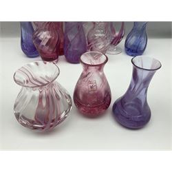 Collection of pink/purple Caithness glass vases, to include mottled and swirl designs, largest 20cm (19)