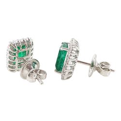 Pair of 18ct white gold octagonal cut emerald and round brilliant cut diamond stud earrings, stamped, total emerald weight approx 3.00 carat