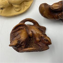 Eight carved netsukes, to include dragon, monkey in a nut, frog, rats etc