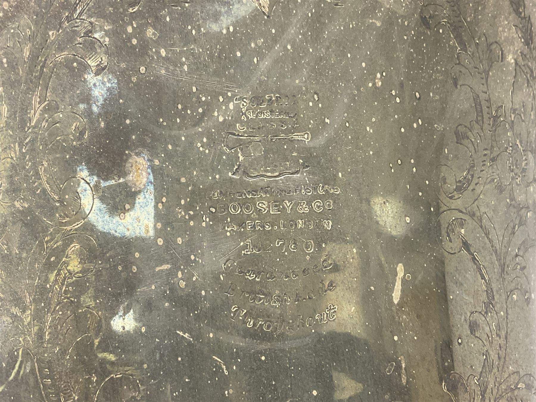 Boosey & Co silver plated 'Solbron' Class A Tuba c1920, serial number 102760, with compensating pistons and foliate engraved decoration H106cm 