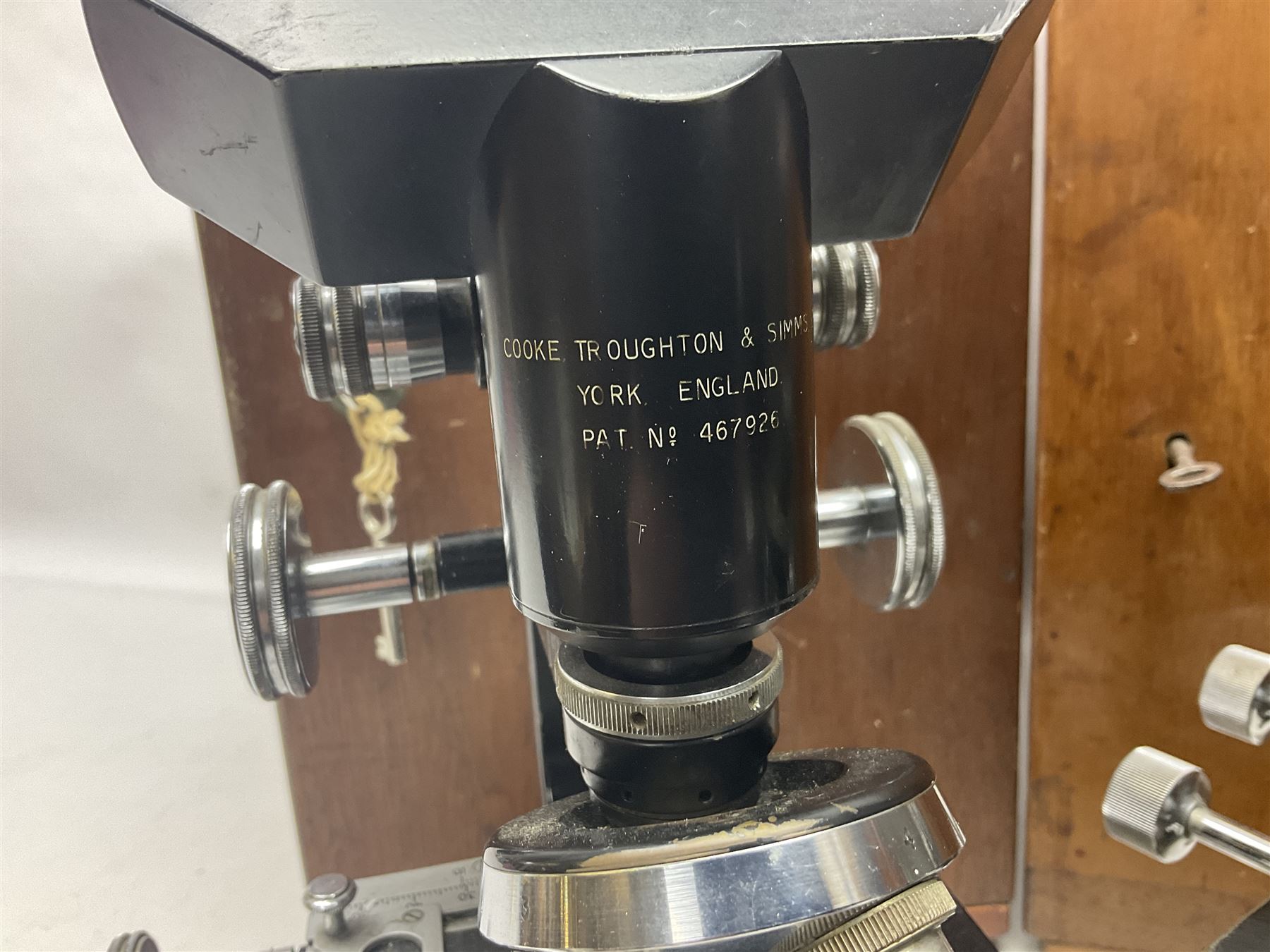 Four microscopes, including Cooke, Troughton & Simms no M467926, W Watson & Sons no 114758, W & J George & Beck Ltd no 36649 and one other 