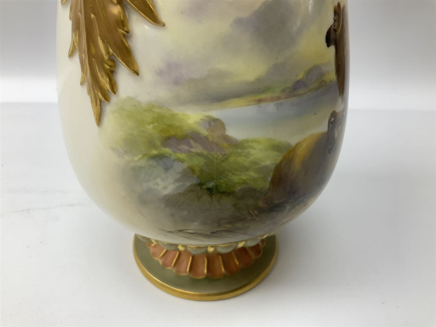 Early 20th century Royal Worcester vase decorated by Harry Davis, of ovoid form with twin acanthus mounted handles and waisted high neck supporting a domed cover, upon a circular foot, the body hand painted with sheep in a highland landscape, signed H Davis, with puce printed marks beneath including shape number 2425, and date code for 1907, H27.5cm