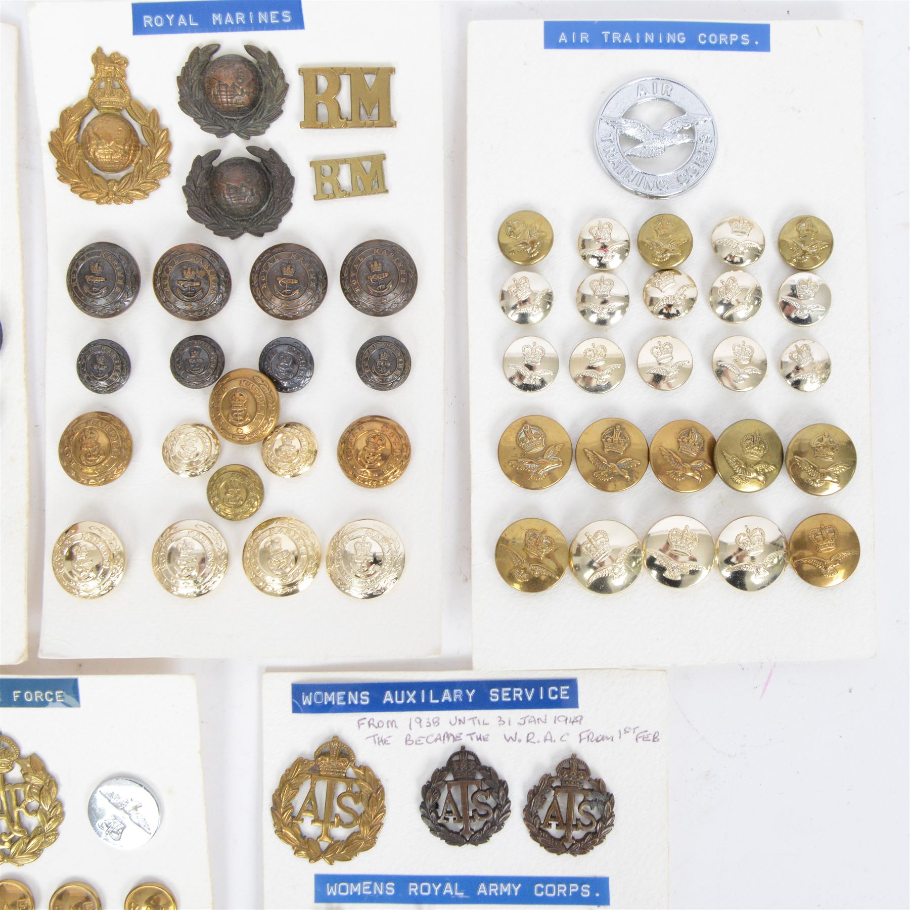Collection of military cap badges and buttons examples from Royal Air Force, Royal Marines, Royal Navy, Air Training Corps, Women's Auxilary Service and Womans Royal Army Corps  