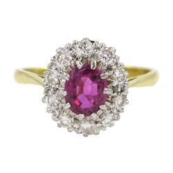 Gold oval ruby and diamond cluster ring, stamped 18ct
