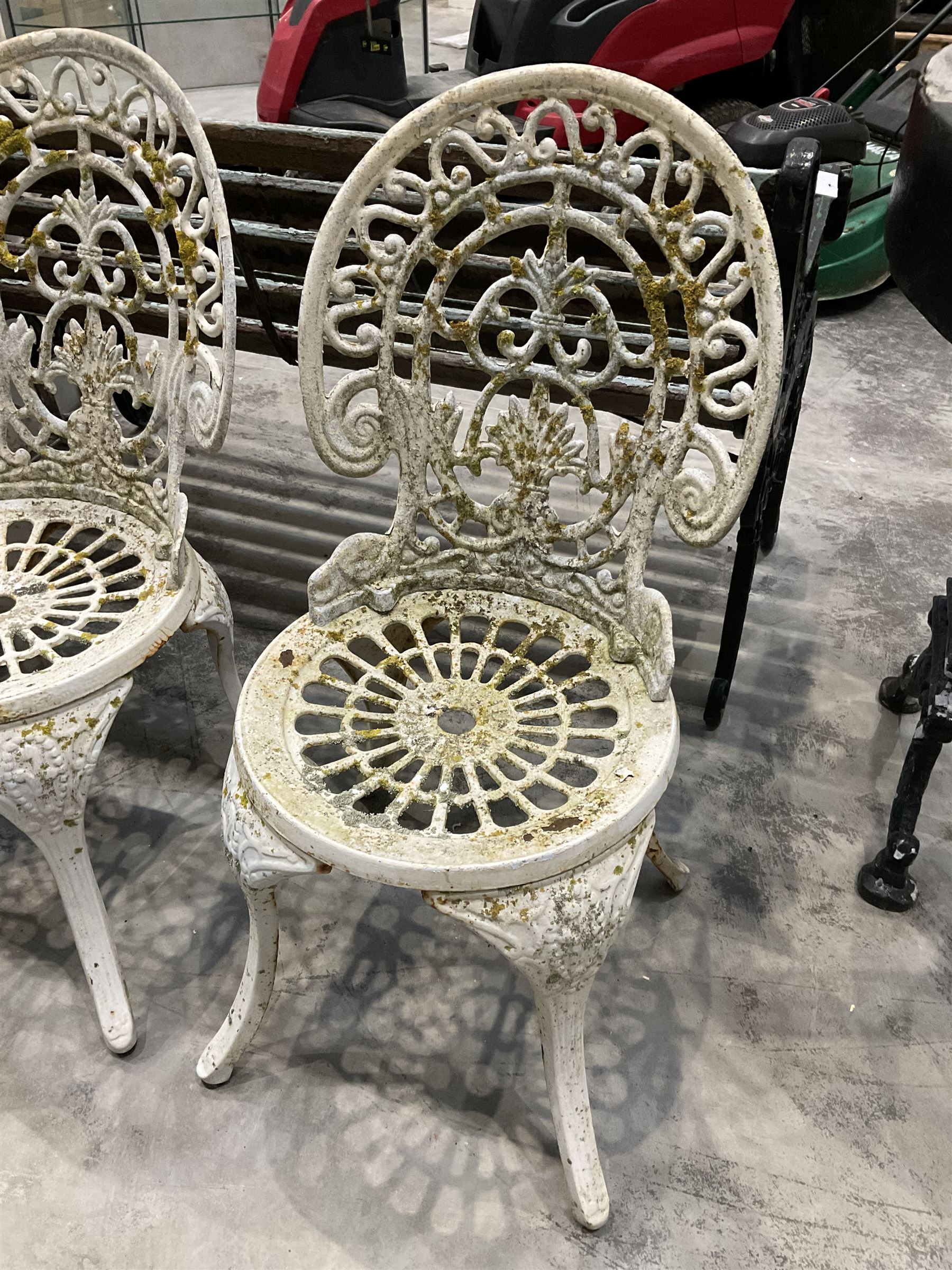 Cast aluminium white painted bench and two chairs - THIS LOT IS TO BE COLLECTED BY APPOINTMENT FROM DUGGLEBY STORAGE, GREAT HILL, EASTFIELD, SCARBOROUGH, YO11 3TX