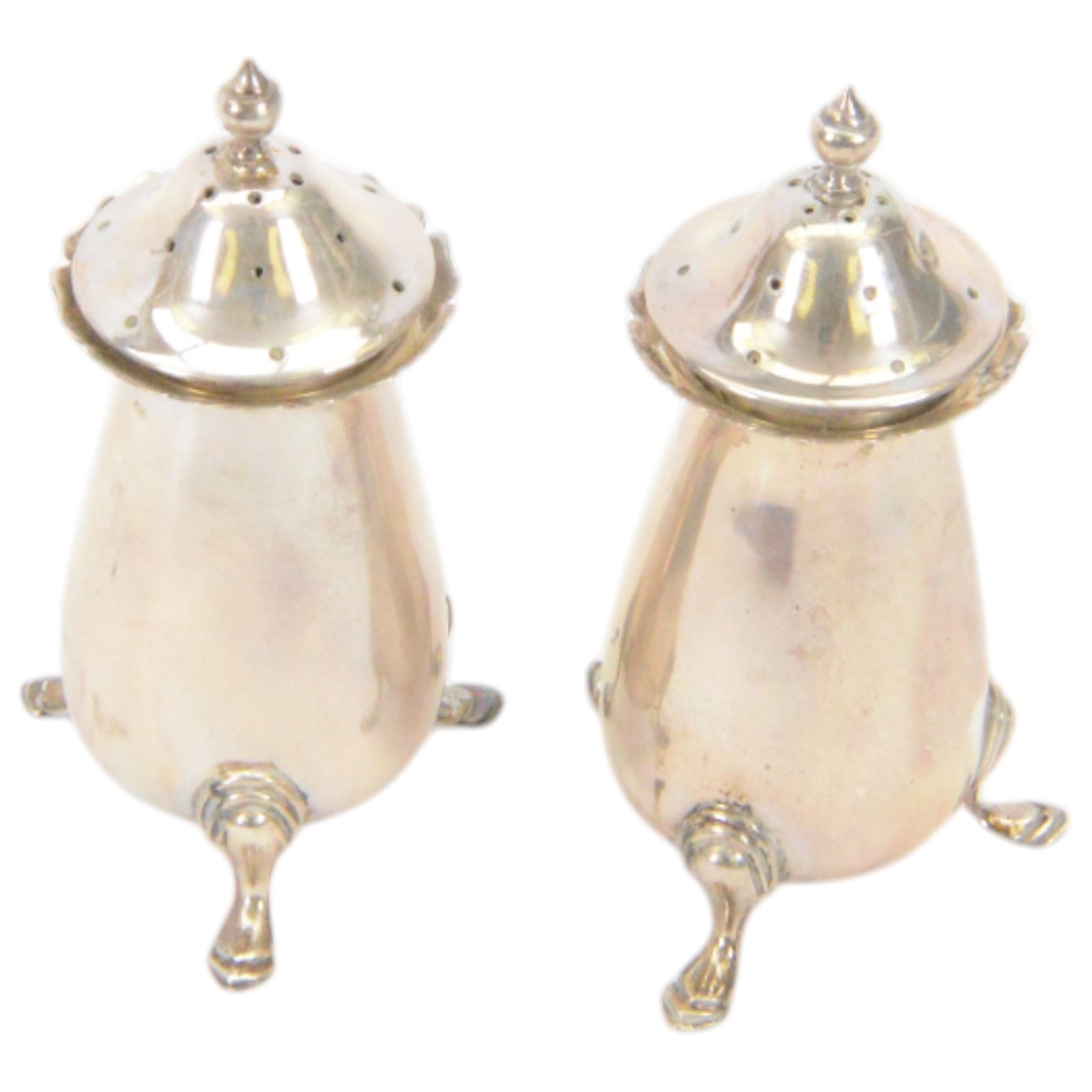 Edwardian silver sauce boat, of typical plain form with shaped rim, with flying C scroll handle and upon three pad feet, hallmarked Birmingham 1907, maker's mark worn and indistinct, together with a pair of Edwardian silver cruets, of urn form, upon three pad feet, hallmarked Horace Woodward & Co Ltd, Birmingham 1905 and a set of six silver apostle spoons, with matching sugar tongs and sugar sifting spoons, some hallmarked Miller Bros, London 1895 and Charles Boynton, all contained within fitted cases