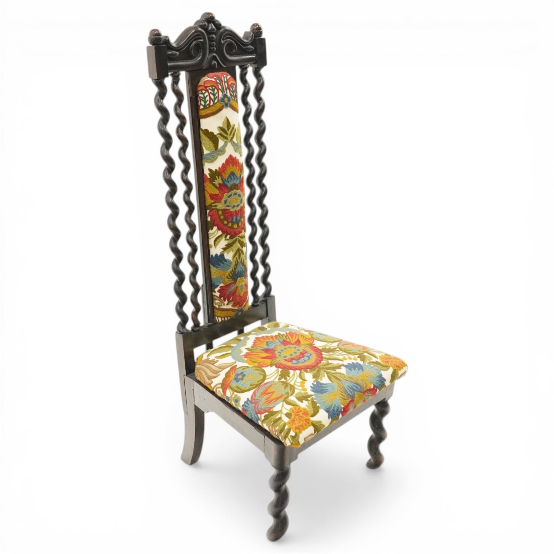 19th century Carolean design oak hall chair, carved cresting rail over barley-twist uprights, high back and loose seat upholstered in wool-work foliate tapestry (W46cm H116cm); 19th century elbow chair mahogany with spiral turned centre rail and roundel-applied frieze (W56cm H85cm)