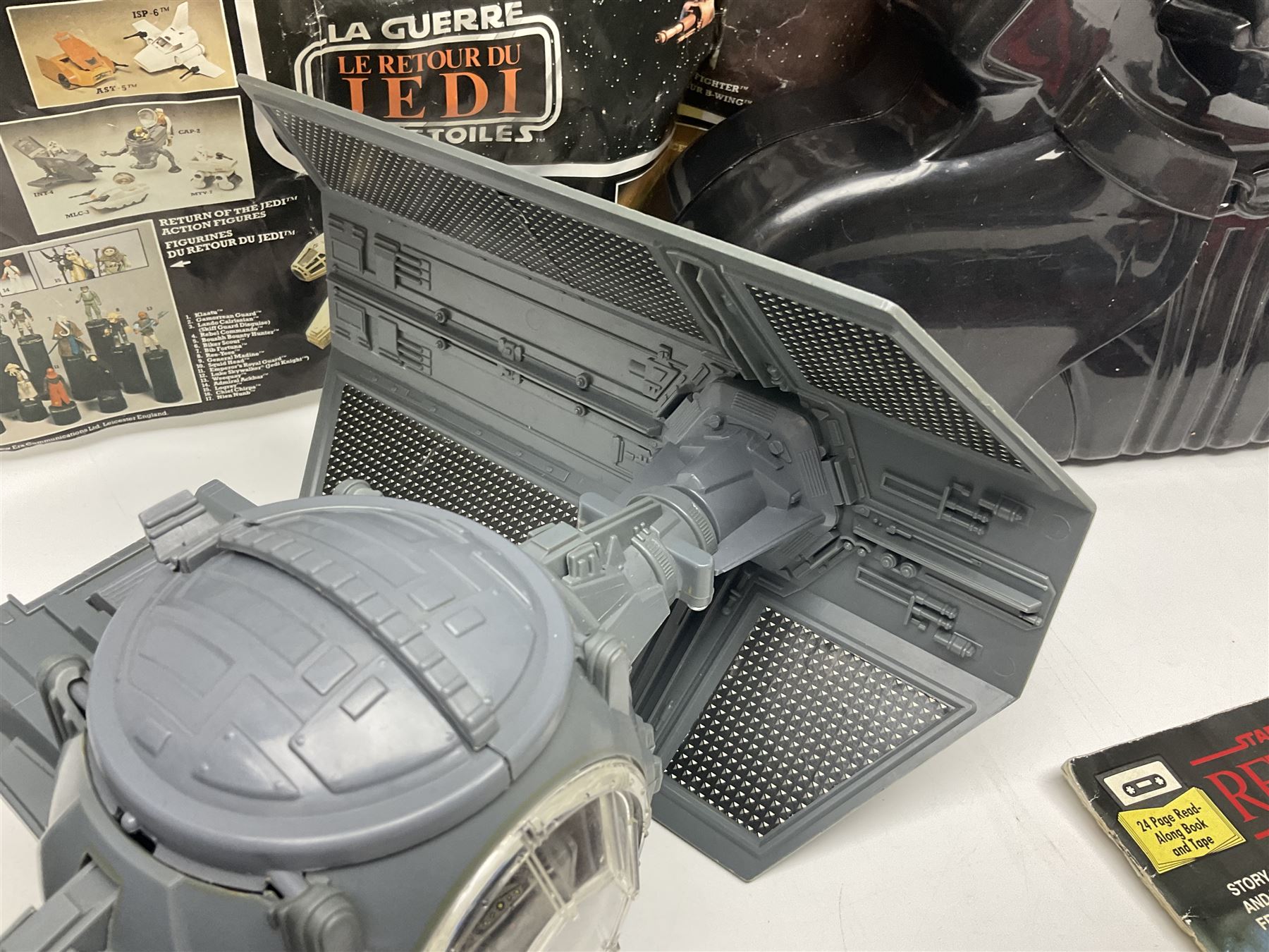 Star Wars - Darth Vader TIE-fighter; Darth Vader head and shoulder shaped figure collection box; 1983 & 1984 Return of the Jedi Annuals; Read Along Book and Tapes; and two posters
