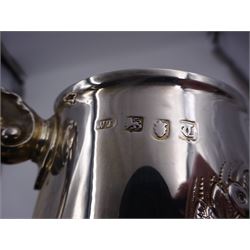 George III silver tankard, of slightly tapering cylindrical from, with chased and repousse crown above a monogrammed cartouche and floral, foliate and C scroll decoration, with acanthus capped C scroll handle, hallmarked WT, possibly William Turton, London 1774, H11.5cm