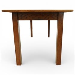 Late 20th century Mackintosh style oak dining table, rectangular top with broad plank surface over shaped frieze with twin pierced oval apertures, raised on square section supports
