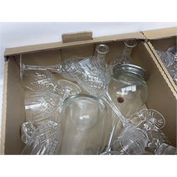 Two Waterford lead crystal glass figures, of a swan and dog, together with other glassware including wine glasses, in two boxes 