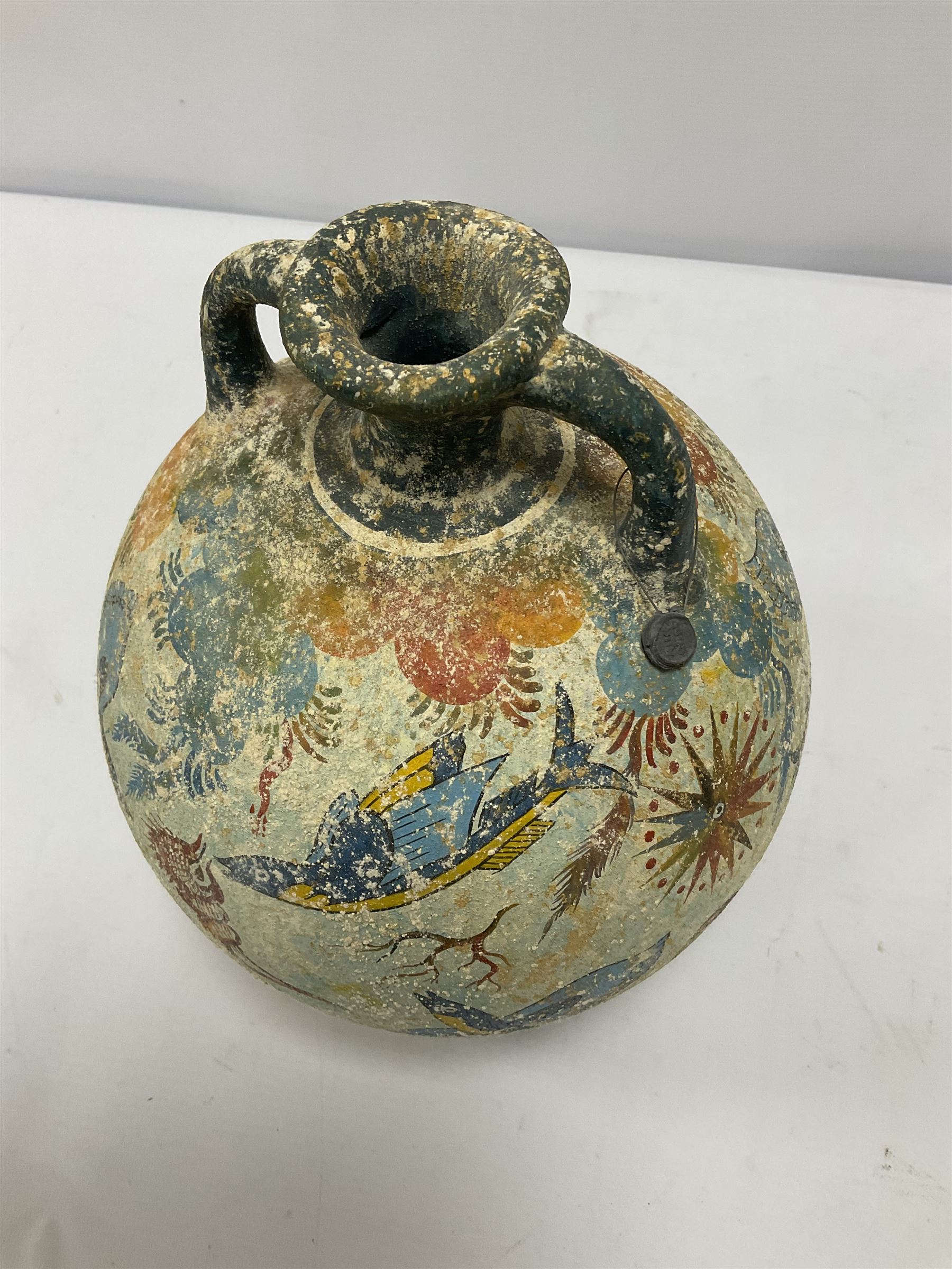 Reproduction Ancient Greek twin handled vase of ovoid form, in the style of Crete Minoan period 1500 B.C, adorned with colourful sea scene of coral and blue fish upon light blue ground, stamped 'From Krete' beneath, H27cm