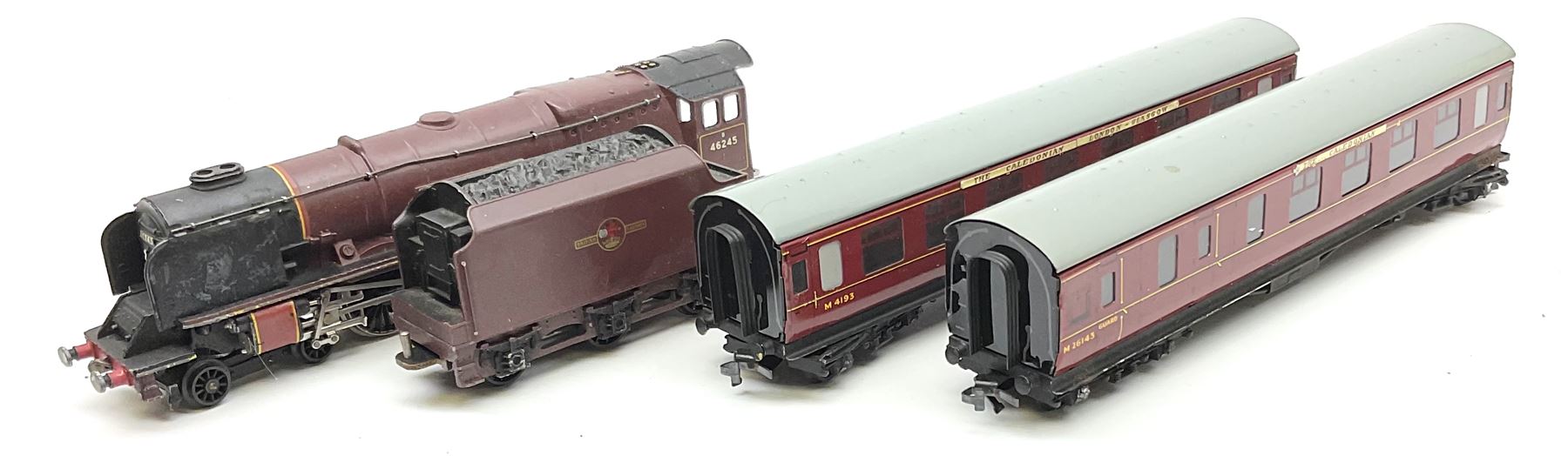 Hornby Dublo - two-rail 2022 'The Caledonian' Passenger Set LMR with Duchess Class 4-6-2 locomotive 'City of London' No.46245 with tender, two coaches and track, box base only, no lid; 4MT Standard 2-6-4 Tank locomotive No.80033 with two Talisman coaches and track in 2019 Goods Train Set box; four unboxed wagons, quantity of track, crane and buffer stops.
