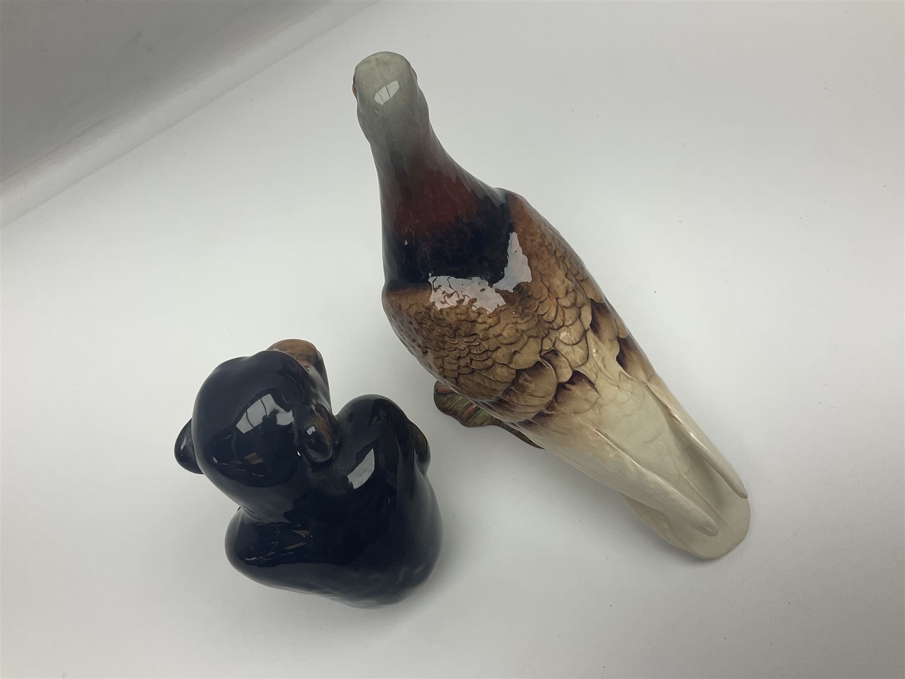 Large Sylvac monkey together with three smaller monkeys, together with Beswick Pigeon no 1383, Melba Ware hippo and baby and Royal Dux elephant 