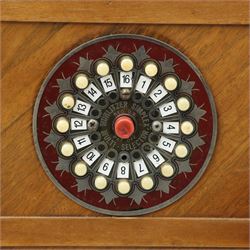 Rudolf Wurlitzer Company - Model 616 'Simplex' 1937 jukebox, figured walnut veneered cabinet with illuminated red and amber side panels enclosed by chromed uprights, glazed upper record compartment, cast Art Deco speaker grille, coin-operated push-button selection panel with circular title index, raised on a moulded base
