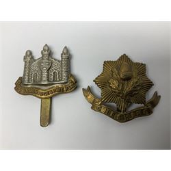 Twenty cap badges including Hertfordshire, Royal Sussex, Cambridgeshire, Hampshire, Notts and Derby, East Surrey, Herefordshire, South Lancashire, Devonshire, Bedfordshire, Durham Light Infantry etc (20)