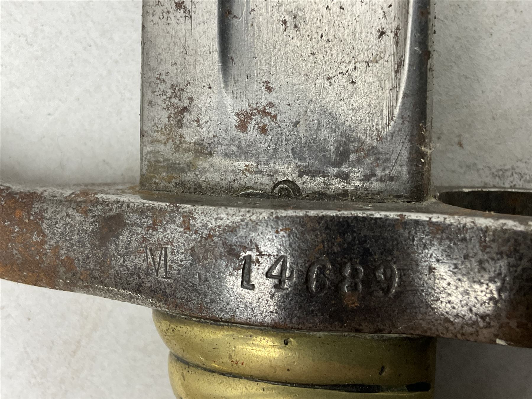 French model 1866 sabre bayonet, the 57.5cm curving blade marked St. Etienne 1873; in associated steel scabbard L71cm; and Mosin-Nagant M1891 socket bayonet with 43cm cruciform blade No.37068 (no scabbard) (2)