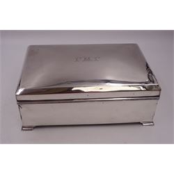 1920s silver mounted presentation cigarette box, of rectangular form, with engraved initials J.W.J and dated 1902-1927 to slightly domed hinged cover, opening to reveal compartmentalised softwood interior, upon four bracket feet, hallmarked Birmingham 1920, maker's mark worn and indistinct, H9cm, W23cm, reputedly given to John William Johnson, father of Amy Johnson,  famous for being the first long distance (to Australia) solo female pilot, and first female British grounds engineer, for his silver wedding anniversary