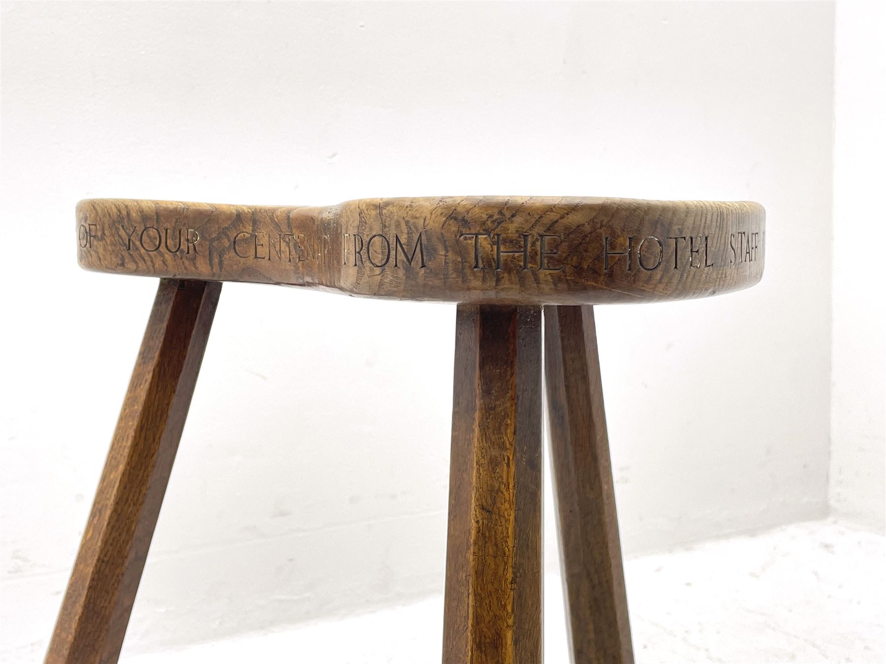 'Mouseman' early 1960s oak stool, dished kidney shaped seat inscribed on edge 