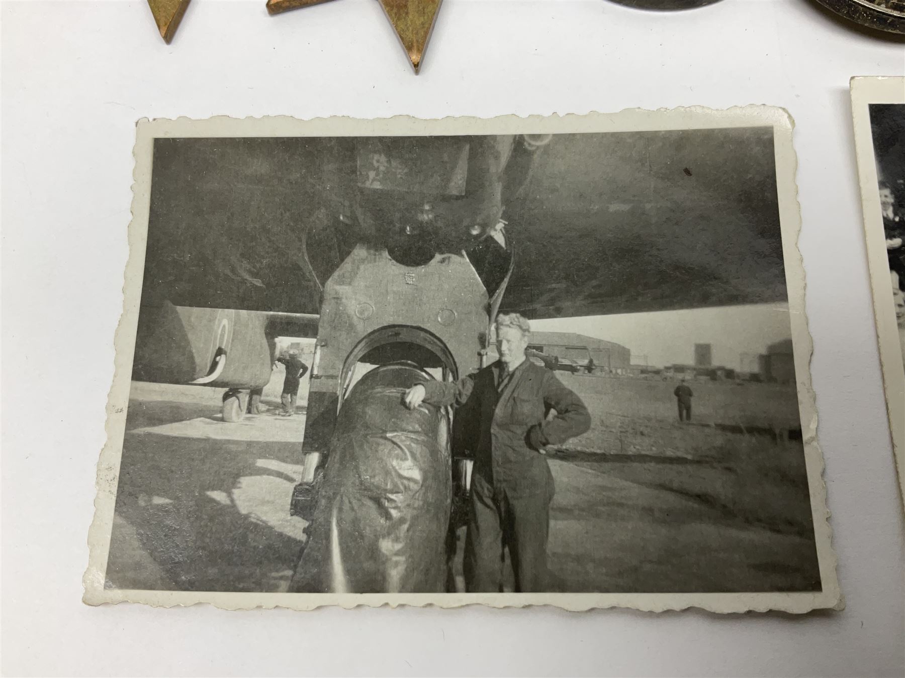 WW2 group of five medals comprising 1939-1945 War Medal, Defence Medal, 1939-1945 Star, France and Germany Star and Canadian Volunteer Service Medal; on wearing bar with ribbons; with a medal box and slip and three photographs