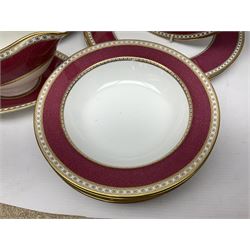 Wedgwood Ulander powder ruby pattern part dinner service, comprising six dinner plates, six side plates, six dessert plates, six soup bowls and sauce boat