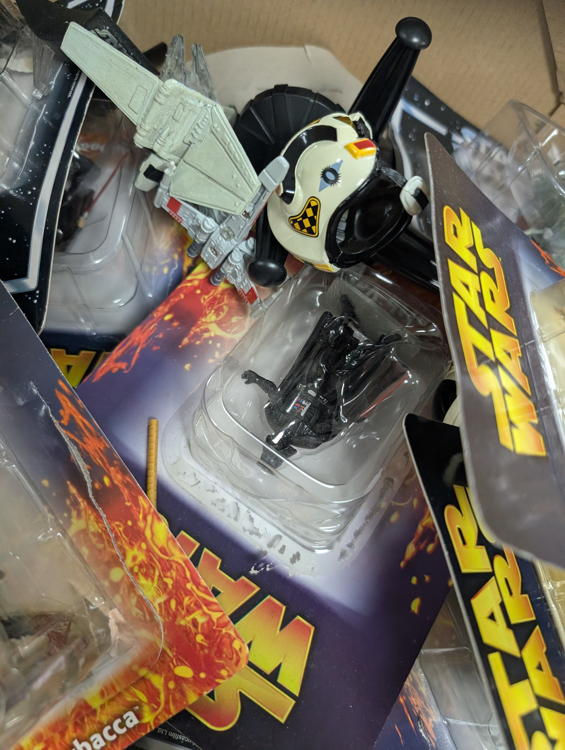 Collection of DeAgostini Star Wars figures, including two limited edition Darth Vader figures, diecast vehicles and figures and miniature helmets