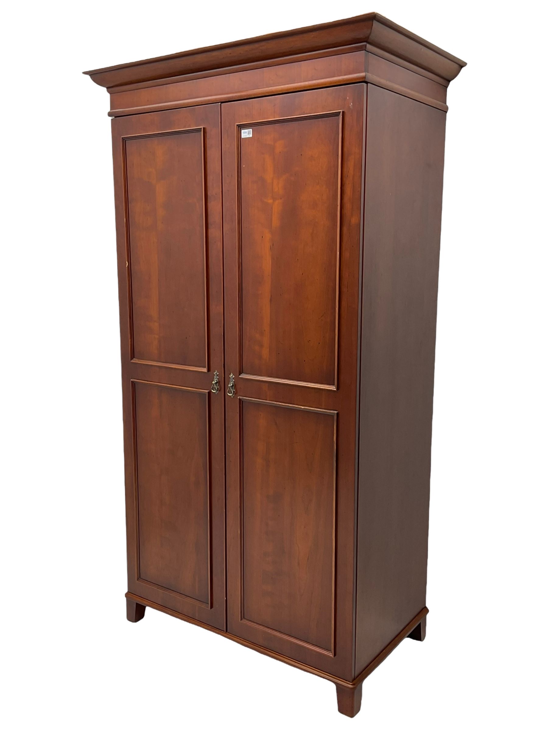 Cherrywood double wardrobe, the interior fitted with hanging rail and shelf