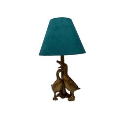 Bronze style table lamp, modelled as two ducks against a tree, with green velvet shade, H47cm

