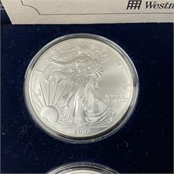 Four one ounce fine silver coins, forming 'The 2003 Famous World Silver Coin Collection', comprising United States eagle, Australian kangaroo, Chinese panda and Canadian maple leaf, cased with Westminster certificate 