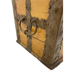 19th century painted oak sea chest, hinged dome top enclosing small compartment, bound by shaped and pressed metal strapwork, scumbled finish to resemble oak and painted with small vignettes depicting portraits and landscapes within panels, fitted with large wrought metal carrying handles, the front inscribed 'H.J.S. 1870' 