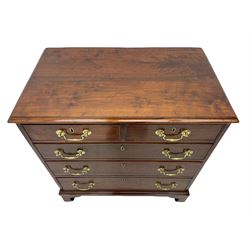 Early 19th century walnut chest, the rectangular moulded top over two short and three long drawers, on bracket feet