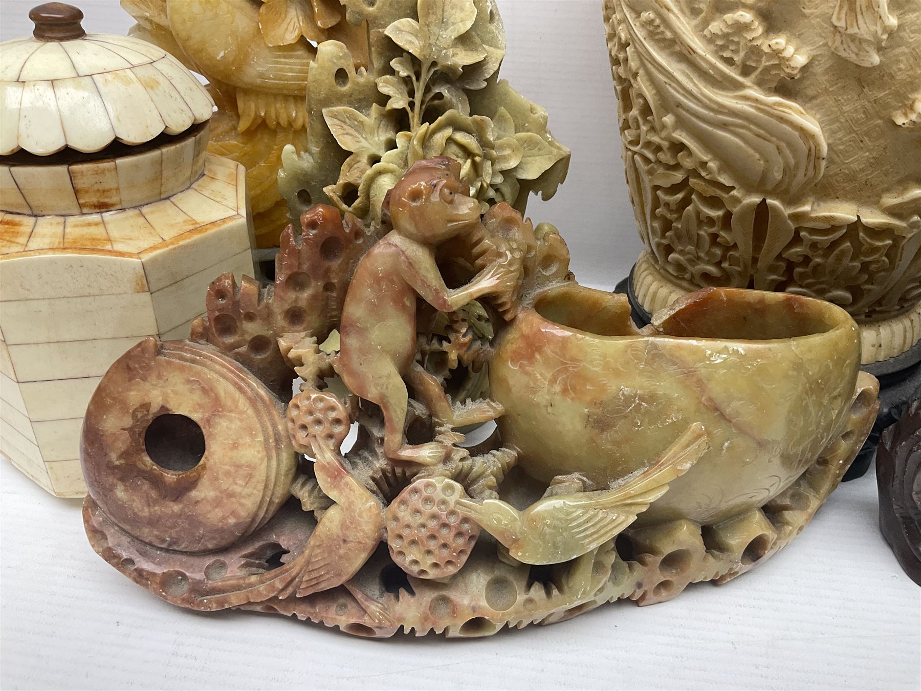 Collection of hardstone and soapstone, including hardstone seal carved temple dogs finial, inscription on base, together with inkwells, vases etc  