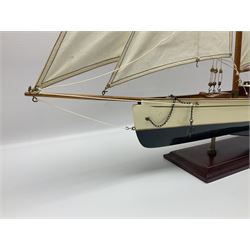 Wooden kit built model yacht with sails, mounted on wooden base, H86cm
